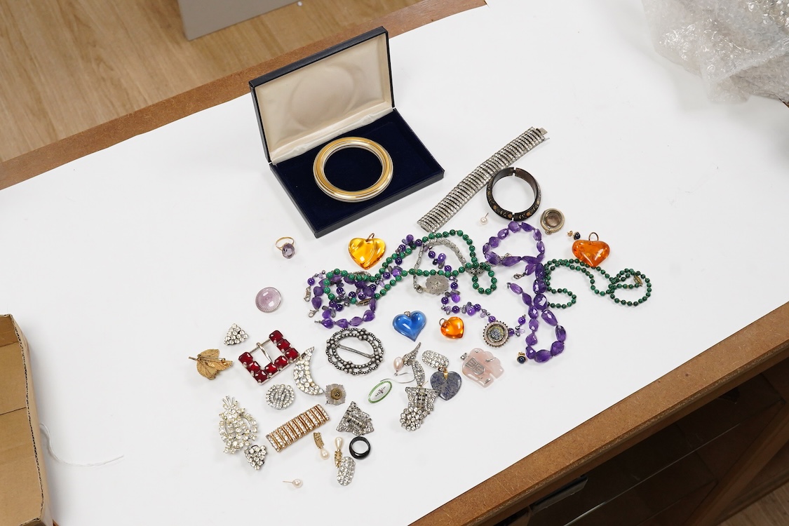 A 9ct and cabochon black onyx set pendant, on a 9ct chain, a 9ct and gem set ring and pair of 9ct and cultured pearl set ear clips, together with other items including costume jewellery, a silver bangle and a silver book